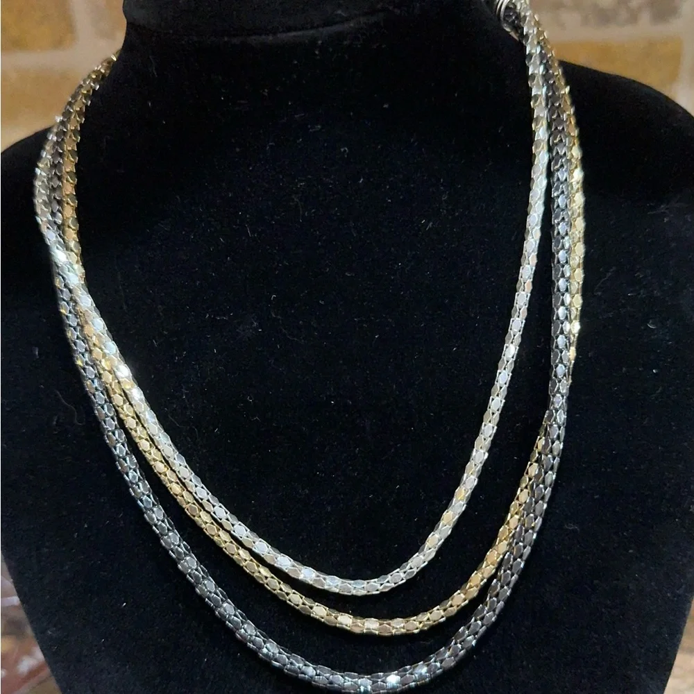 Necklace 3 Strand looks like Gold Silver Platinum. 16 to 20 in adjustabl…